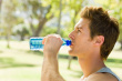 young man drinking water